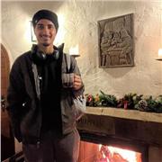 A University student who is willing to teach English.